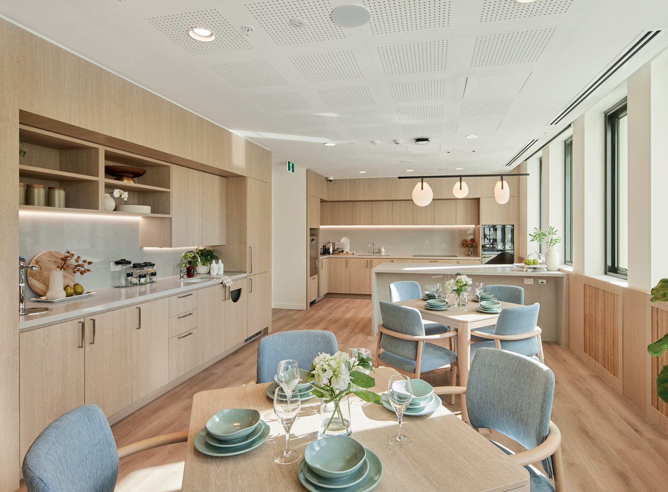 Communal lounge, dining room and kitchen at The Alba Care Suites.
